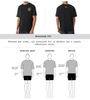 Front and back view of a black oversized t-shirt with a small chest graphic and a fit comparison diagram.