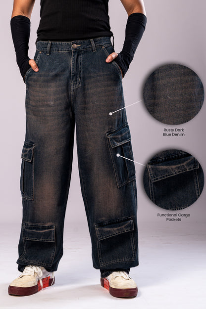 Front view of a person wearing dark, rusty-blue baggy cargo jeans, with two circular insets highlighting the 
