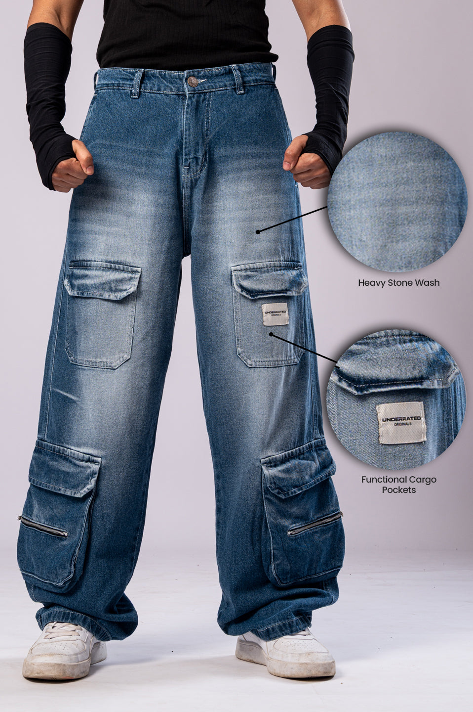 Front view of a person wearing light-wash blue baggy cargo jeans, with two circular insets highlighting the "Heavy Stone Wash" fabric and "Functional Cargo Pockets."