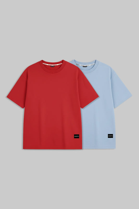 Two short-sleeve crewneck t-shirts displayed side-by-side on a solid.