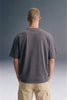 Men's Dark Grey Oversized T-Shirt with Beige Pants — Front View Streetwear | Underrated Club

