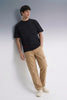 Men's Black Oversized T-Shirt Full Length — Paired with Khaki Pants | Streetwear Outfit
