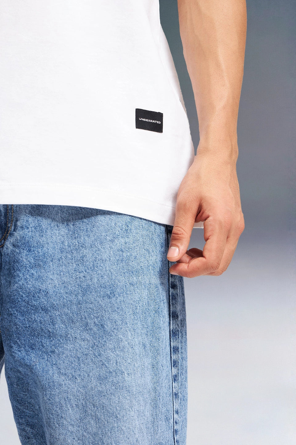 White Oversized T-Shirt Label Detail — Premium Quality Streetwear | Underrated Club
