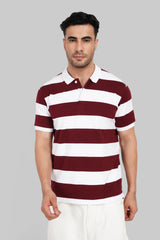 A man wearing a maroon and white horizontally striped polo shirt with a solid white collar.