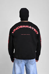 Back view of a black sweatshirt featuring large red 
