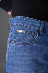 Side angle blue jeans waistband 