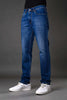 Underrated Club men's slim fit blue jeans front view casual denim pants white sneakers urban fashion product photo.

