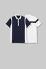 Flat lay of two polo shirts in navy blue and white, showcasing the diagonal panelled athletic design.