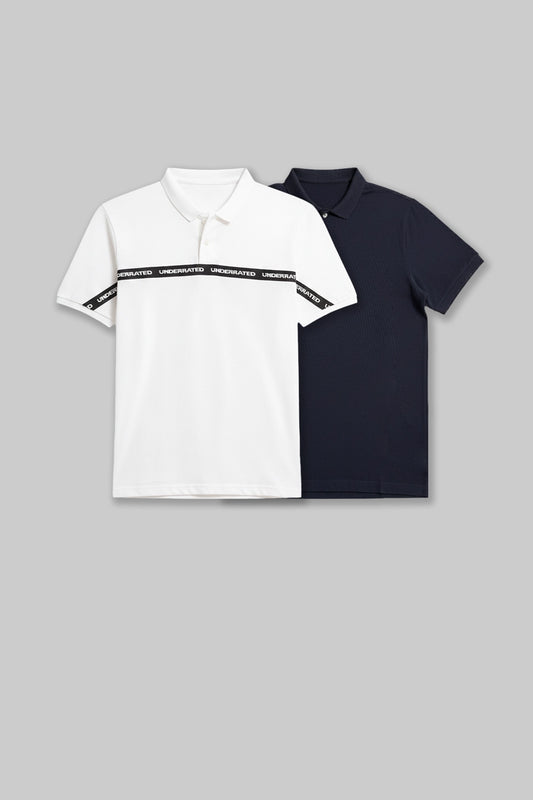 Flat lay of two polo shirts in white and navy blue, featuring a single bold horizontal stripe across the chest.