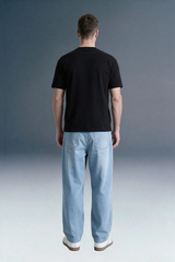 Back View of Men’s Relaxed Fit Black T-Shirt and Light Wash Jeans