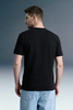 Rear Angle of Men’s Casual Black Streetwear Outfit