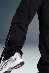 Close-Up of Black Cargo Pants Hem and Sneaker Styling