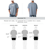 Front and back view of a light blue oversized t-shirt with chest graphics and a fit comparison diagram.