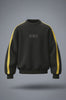 Black raglan crewneck sweatshirt with thick yellow stripes on the sleeves and a tonal URC logo on the chest.