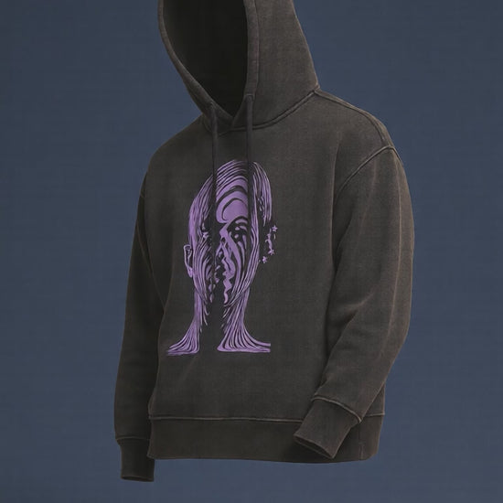 Black hoodie with artistic distorted face graphic in purple trendy streetwear design for men.