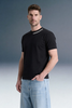 Black Oversized T-Shirt Styled with Light Blue Baggy Jeans